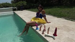 Snow White cosplayer tries adult toys poolside